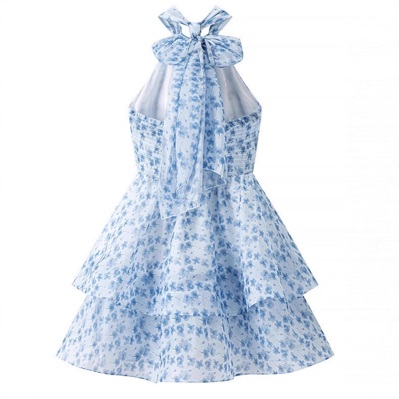Robe bleue imprimée coupe slim au style féerique de villégiature.