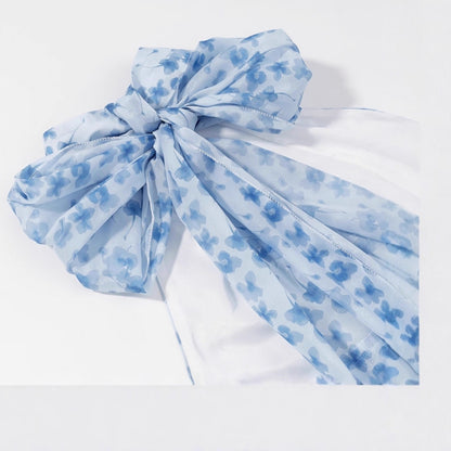 Robe bleue imprimée coupe slim au style féerique de villégiature.